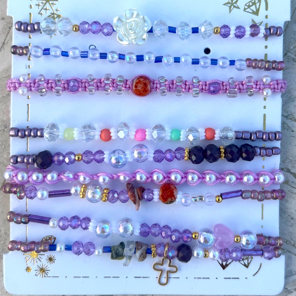 Handmade Colombian beaded purple theme bracelets.